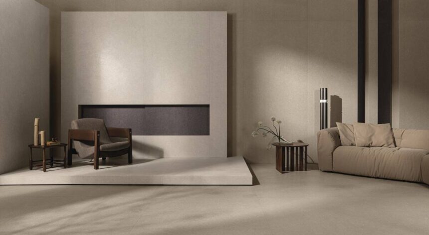 Ambiente contemporâneo com revestimento Kalks da Portobello, destacando tons neutros, textura elegante e mobiliário sofisticado.