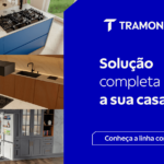 Ambientes de cozinha modernos equipados com eletrodomésticos Tramontina, incluindo cooktops, pias, coifas e refrigeradores, com destaque para soluções completas em design e tecnologia no showroom de Alphaville, SP.